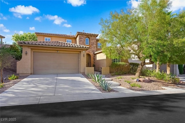 11340 Espadrille Ct, Las Vegas, NV 89138 - mediterranean / spanish home featuring stucco siding, a tile roof, a garage, and concrete driveway