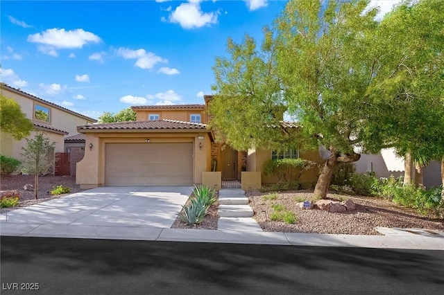 11340 Espadrille Ct, Las Vegas, NV 89138 - view of front of house with stucco siding, a garage, driveway, and a tile roof