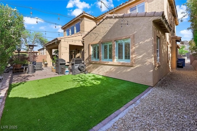 11340 Espadrille Ct, Las Vegas, NV 89138 - rear view of house featuring stucco siding and a patio