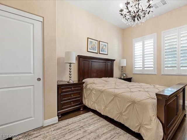 2400 Trissino Ct, Henderson, NV 89044 - bedroom with a chandelier and baseboards