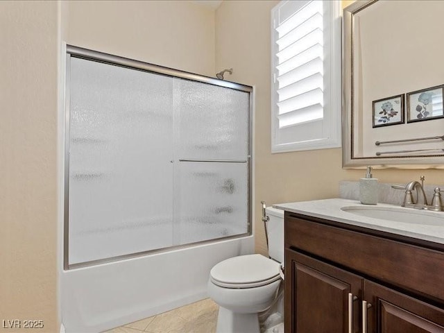 2400 Trissino Ct, Henderson, NV 89044 - full bath featuring vanity, toilet, enclosed tub / shower combo, and tile patterned flooring