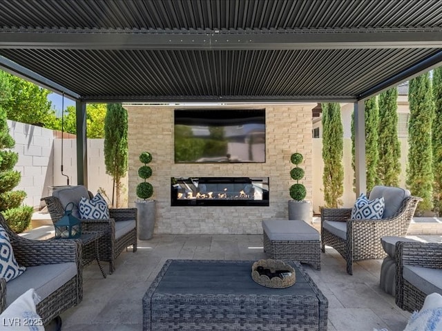 2400 Trissino Ct, Henderson, NV 89044 - view of patio featuring an outdoor living space with a fireplace
