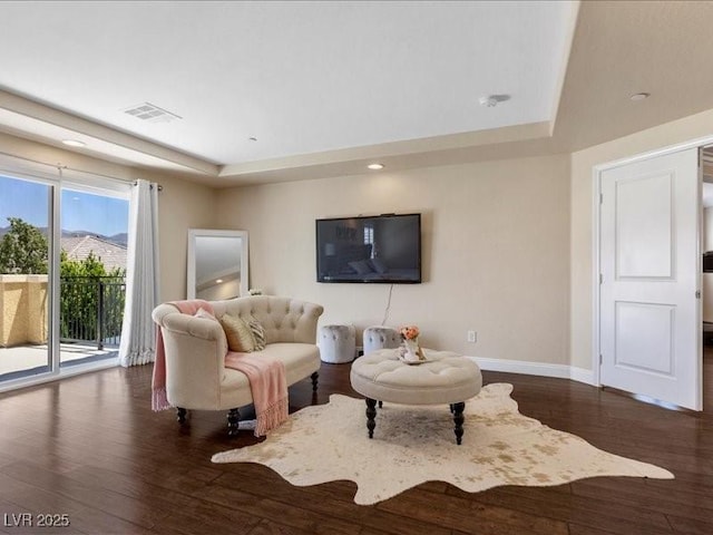 2400 Trissino Ct, Henderson, NV 89044 - living room featuring a raised ceiling, wood finished floors, baseboards, and recessed lighting