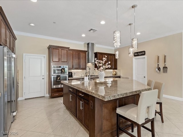 2400 Trissino Ct, Henderson, NV 89044 - kitchen featuring stainless steel appliances, wall chimney exhaust hood, tasteful backsplash, baseboards, and light tile patterned floors