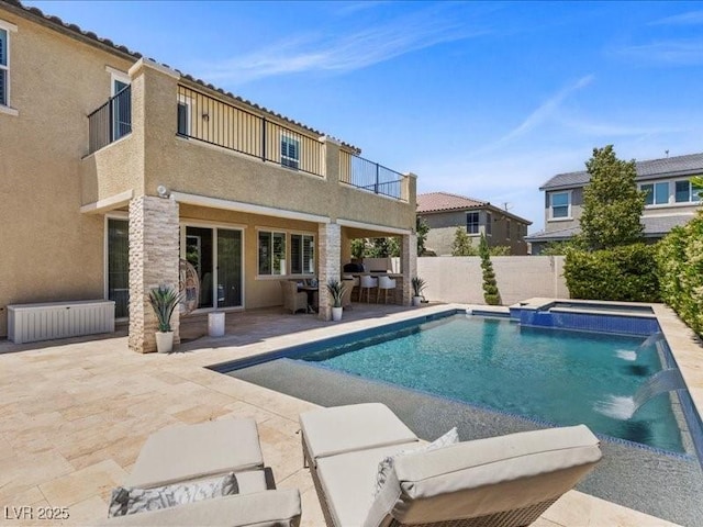 2400 Trissino Ct, Henderson, NV 89044 - view of swimming pool with a patio and a pool with connected hot tub
