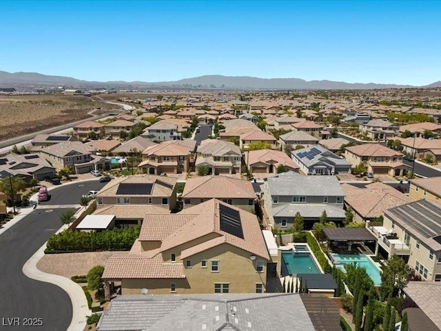 2400 Trissino Ct, Henderson, NV 89044 - aerial view of residential area featuring a mountain backdrop and a pool