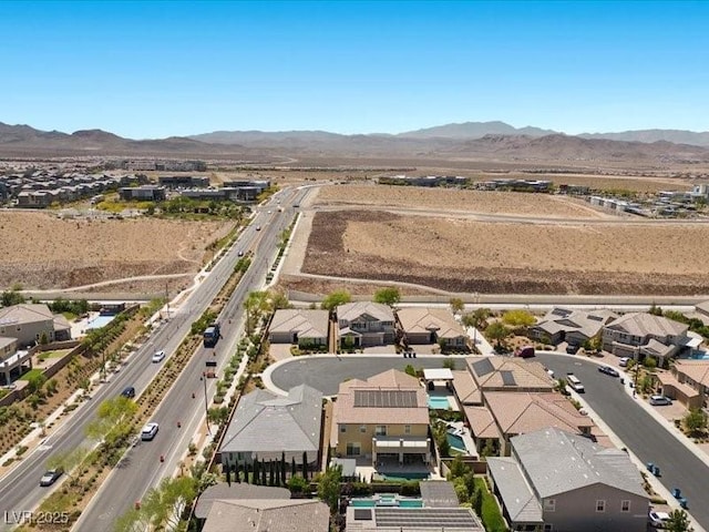 2400 Trissino Ct, Henderson, NV 89044 - aerial perspective of suburban area with a mountainous background and a highway
