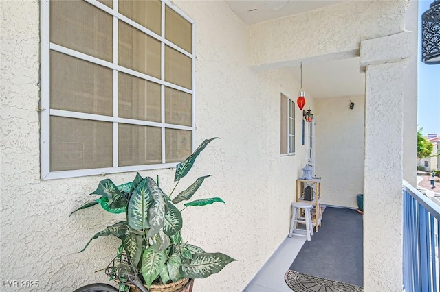 2725 S Nellis Blvd Unit 2084, Las Vegas, NV 89121 - doorway to property with stucco siding