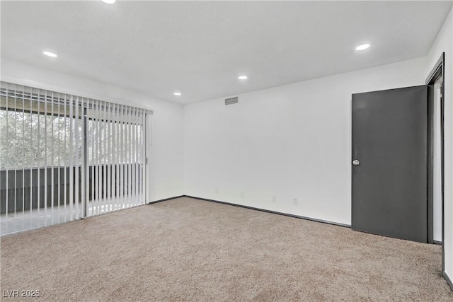 1390 Vegas Valley Dr Unit 26, Las Vegas, NV 89169 - unfurnished room with carpet flooring and recessed lighting