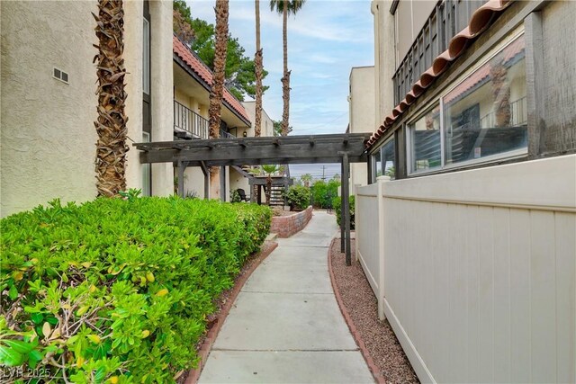 1390 Vegas Valley Dr Unit 26, Las Vegas, NV 89169 - surrounding community with a pergola