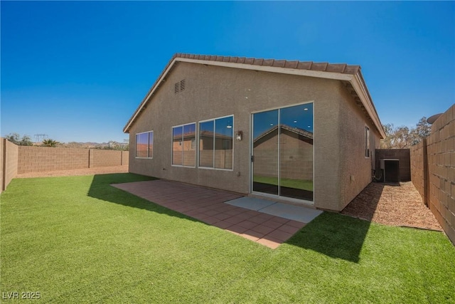 909 Trinity Pond Cir, Henderson, NV 89002 - rear view of house with stucco siding and a patio area