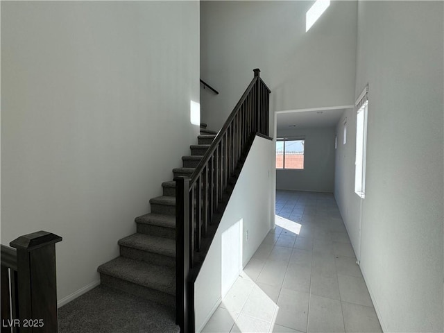 5175 Capucina St Lot 5, Las Vegas, NV 89122 - stairs featuring a high ceiling and tile patterned floors