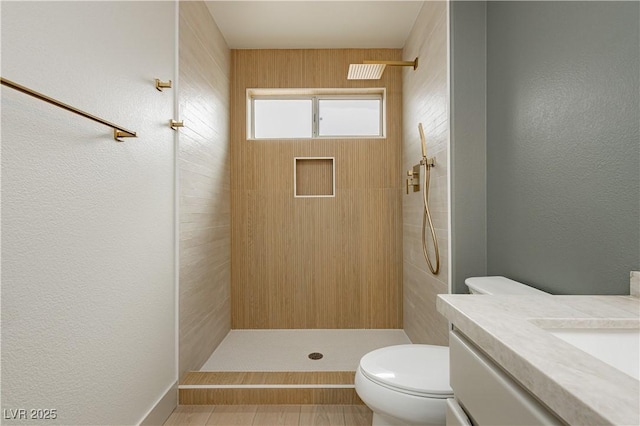 10309 Georgetown Pl, Las Vegas, NV 89134 - bathroom with tiled shower, vanity, toilet, and a textured wall