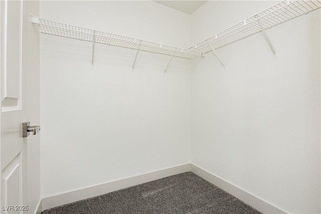 10309 Georgetown Pl, Las Vegas, NV 89134 - spacious closet featuring dark carpet