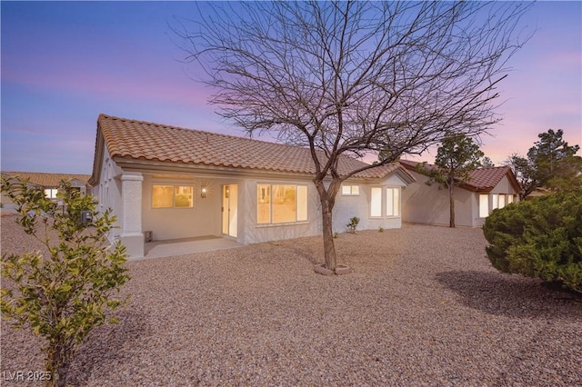 10309 Georgetown Pl, Las Vegas, NV 89134 - view of front of house featuring a tile roof and stucco siding