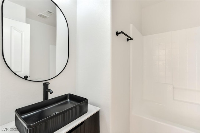 4779 Straight Flush Dr Unit 103, Las Vegas, NV 89122 - bathroom featuring shower / bath combination and vanity