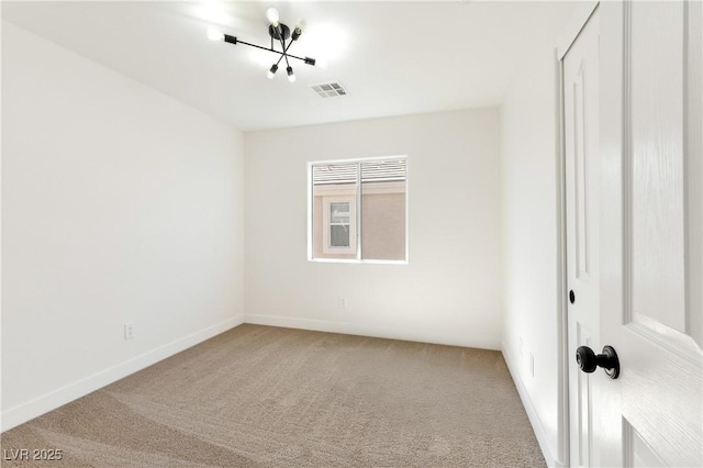 4779 Straight Flush Dr Unit 103, Las Vegas, NV 89122 - carpeted spare room with baseboards and a chandelier