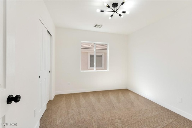 4779 Straight Flush Dr Unit 103, Las Vegas, NV 89122 - unfurnished bedroom featuring a chandelier, carpet floors, a closet, and baseboards