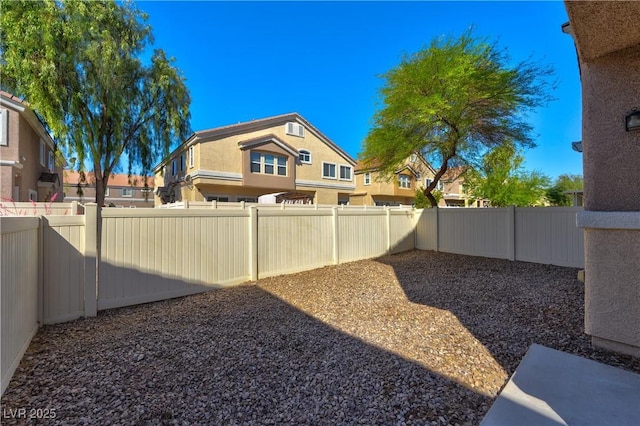 4779 Straight Flush Dr Unit 103, Las Vegas, NV 89122 - fenced backyard with a residential view