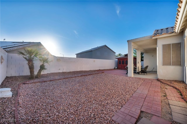 4005 Poppy Fields Dr, Las Vegas, NV 89129 - fenced backyard featuring a patio area