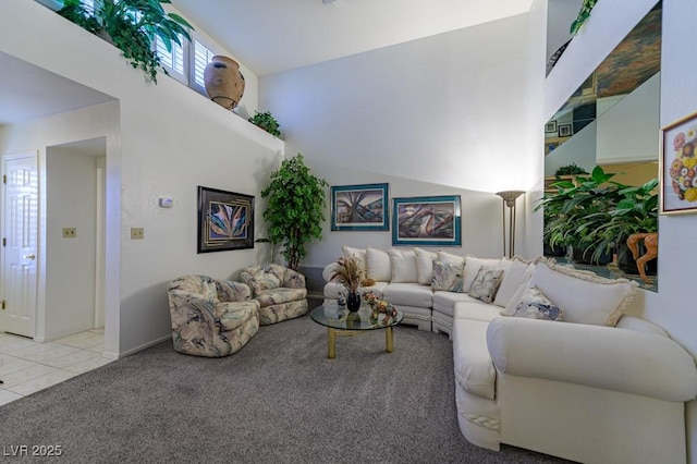2437 Desert Butte Dr, Las Vegas, NV 89134 - carpeted living area with tile patterned floors and a high ceiling