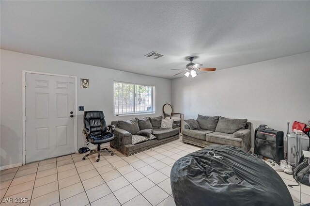 4 Britz Cir, North Las Vegas, NV 89030 - living room featuring ceiling fan and light tile patterned flooring