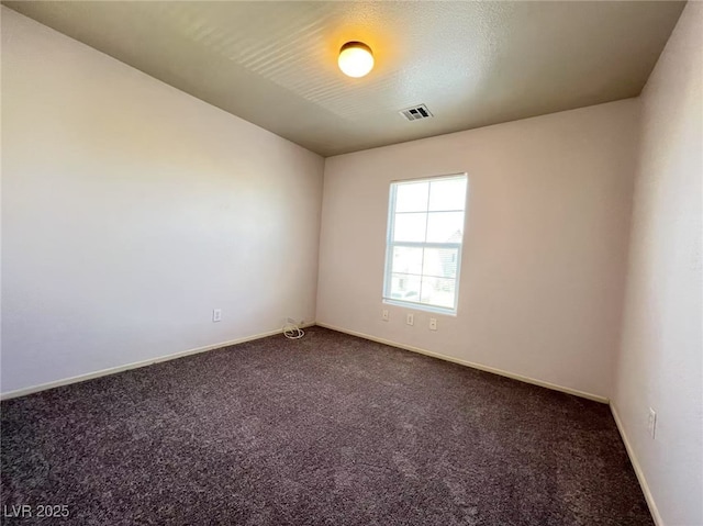 7249 Old Glory St, Las Vegas, NV 89148 - spare room featuring dark carpet and baseboards