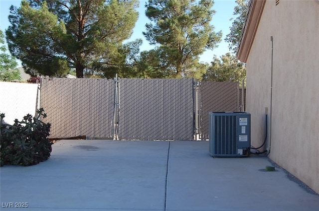 30 Diamond Bar Rd, Pahrump, NV 89048 - view of patio / terrace featuring central AC and a gate