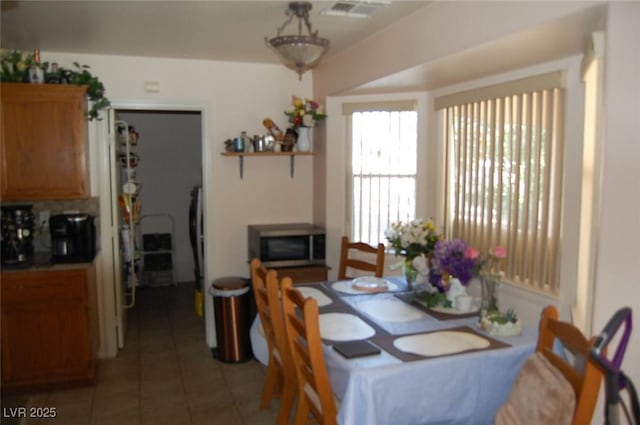 30 Diamond Bar Rd, Pahrump, NV 89048 - dining area with light tile patterned floors