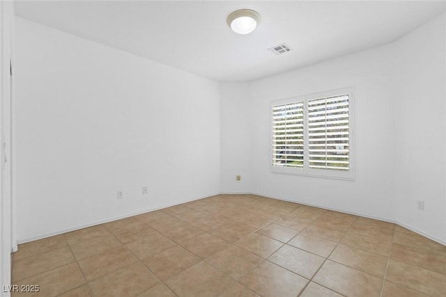 7448 Lintwhite St, North Las Vegas, NV 89084 - unfurnished room with light tile patterned flooring