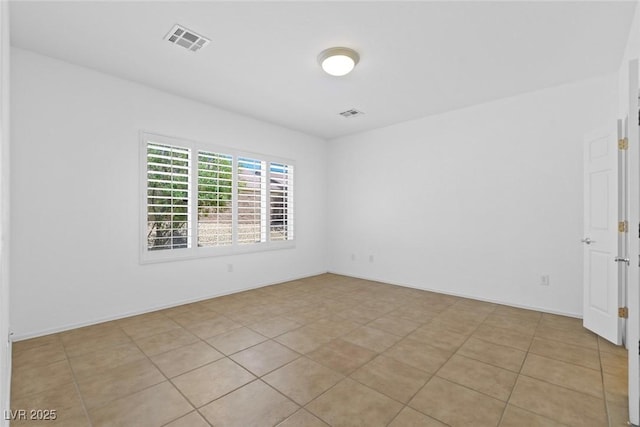 7448 Lintwhite St, North Las Vegas, NV 89084 - empty room featuring light tile patterned flooring