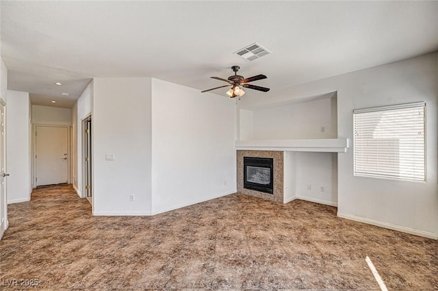 74 Harbor Coast St, Las Vegas, NV 89148 - unfurnished living room with a tile fireplace, ceiling fan, baseboards, and recessed lighting