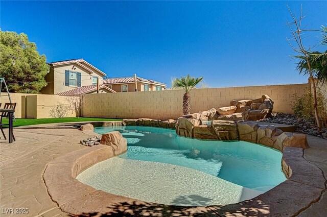 74 Harbor Coast St, Las Vegas, NV 89148 - view of swimming pool featuring a fenced backyard and a patio area