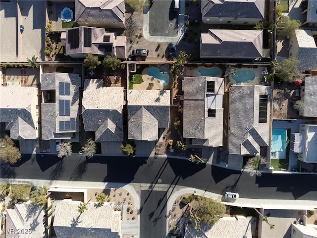 74 Harbor Coast St, Las Vegas, NV 89148 - aerial view of property's location with a pool area and nearby suburban area