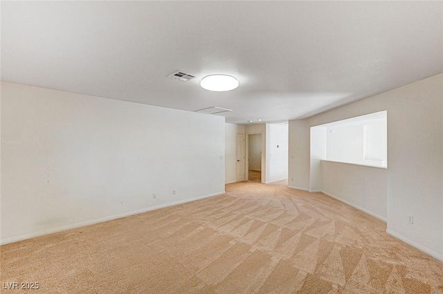 74 Harbor Coast St, Las Vegas, NV 89148 - spare room featuring light carpet and baseboards