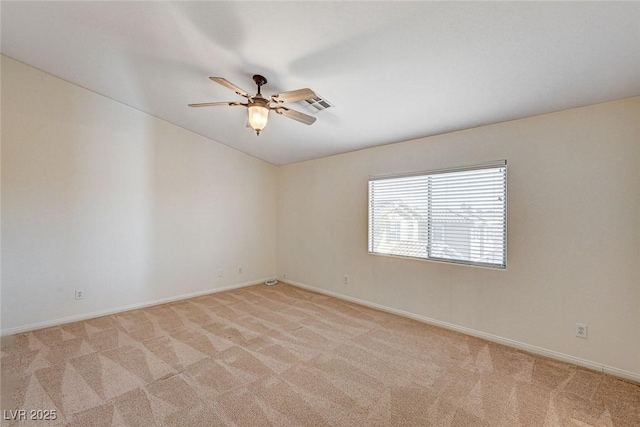 74 Harbor Coast St, Las Vegas, NV 89148 - empty room featuring light colored carpet, baseboards, ceiling fan, and vaulted ceiling