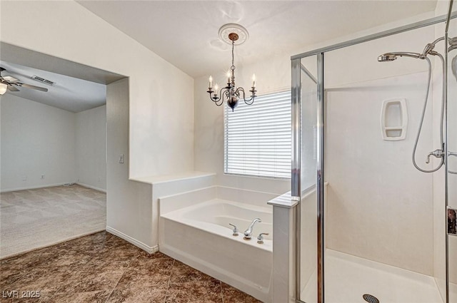 74 Harbor Coast St, Las Vegas, NV 89148 - full bathroom with a stall shower, a chandelier, a bath, ceiling fan, and baseboards
