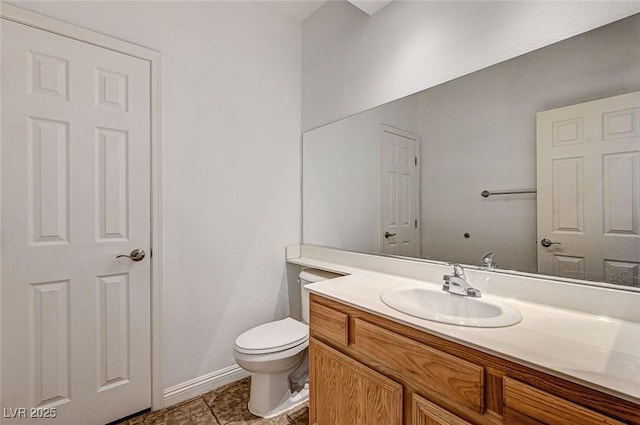 74 Harbor Coast St, Las Vegas, NV 89148 - half bathroom featuring vanity, toilet, and baseboards