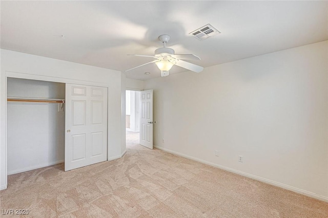 74 Harbor Coast St, Las Vegas, NV 89148 - unfurnished bedroom featuring carpet, a closet, baseboards, and a ceiling fan