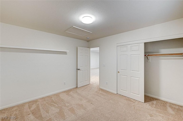 74 Harbor Coast St, Las Vegas, NV 89148 - unfurnished bedroom featuring carpet floors, attic access, a closet, baseboards, and a textured ceiling