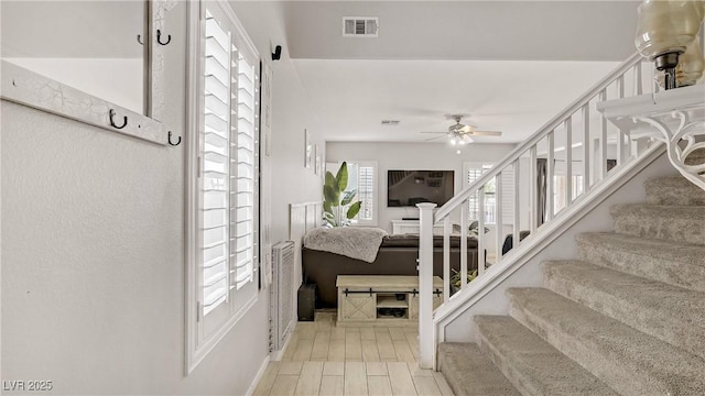 482 Painted Sage Ct, Henderson, NV 89015 - staircase with a ceiling fan and baseboards