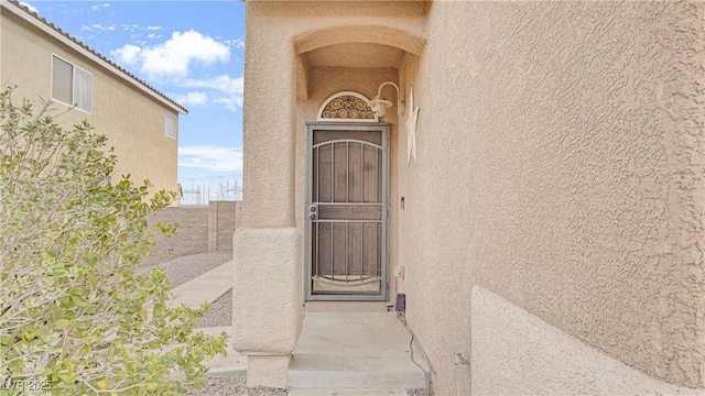 482 Painted Sage Ct, Henderson, NV 89015 - doorway to property with stucco siding