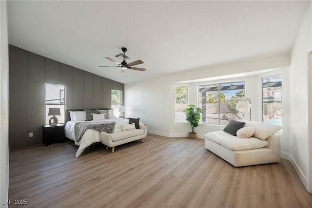 4016 Tyler William Ln, Las Vegas, NV 89130 - bedroom featuring vaulted ceiling, light wood finished floors, baseboards, and ceiling fan
