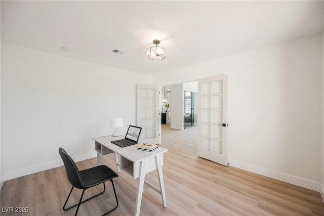 4016 Tyler William Ln, Las Vegas, NV 89130 - office space with french doors, baseboards, and light wood-type flooring