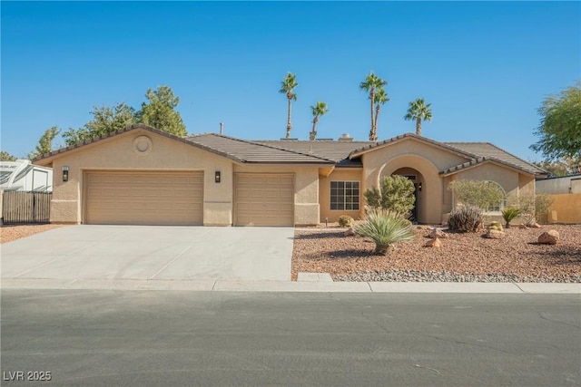 4016 Tyler William Ln, Las Vegas, NV 89130 - ranch-style house with a garage, stucco siding, concrete driveway, and a tiled roof