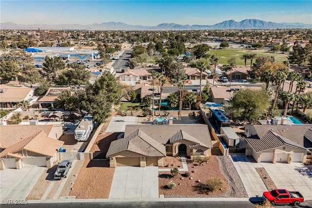 4016 Tyler William Ln, Las Vegas, NV 89130 - aerial perspective of suburban area with mountains