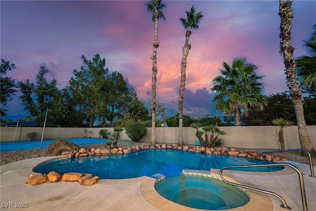 4016 Tyler William Ln, Las Vegas, NV 89130 - view of pool with a fenced backyard and a pool with connected hot tub