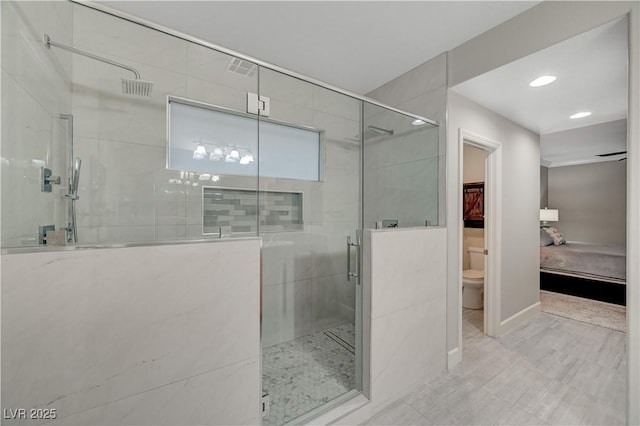 8128 Devils Canyon St, North Las Vegas, NV 89085 - full bathroom featuring toilet, ensuite bath, a stall shower, baseboards, and recessed lighting