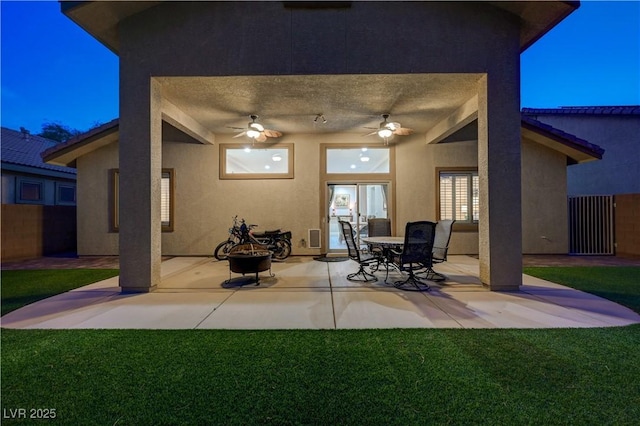 8128 Devils Canyon St, North Las Vegas, NV 89085 - view of patio / terrace with an outdoor fire pit and ceiling fan
