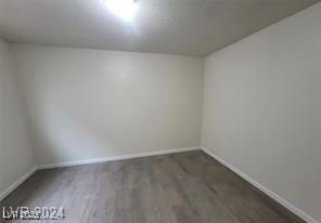 304 Orland St Unit 39, Las Vegas, NV 89107 - bonus room with baseboards and wood finished floors